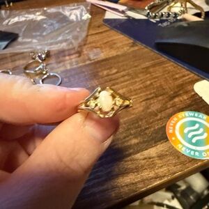 Elegant Opal and white Sapphire Ring